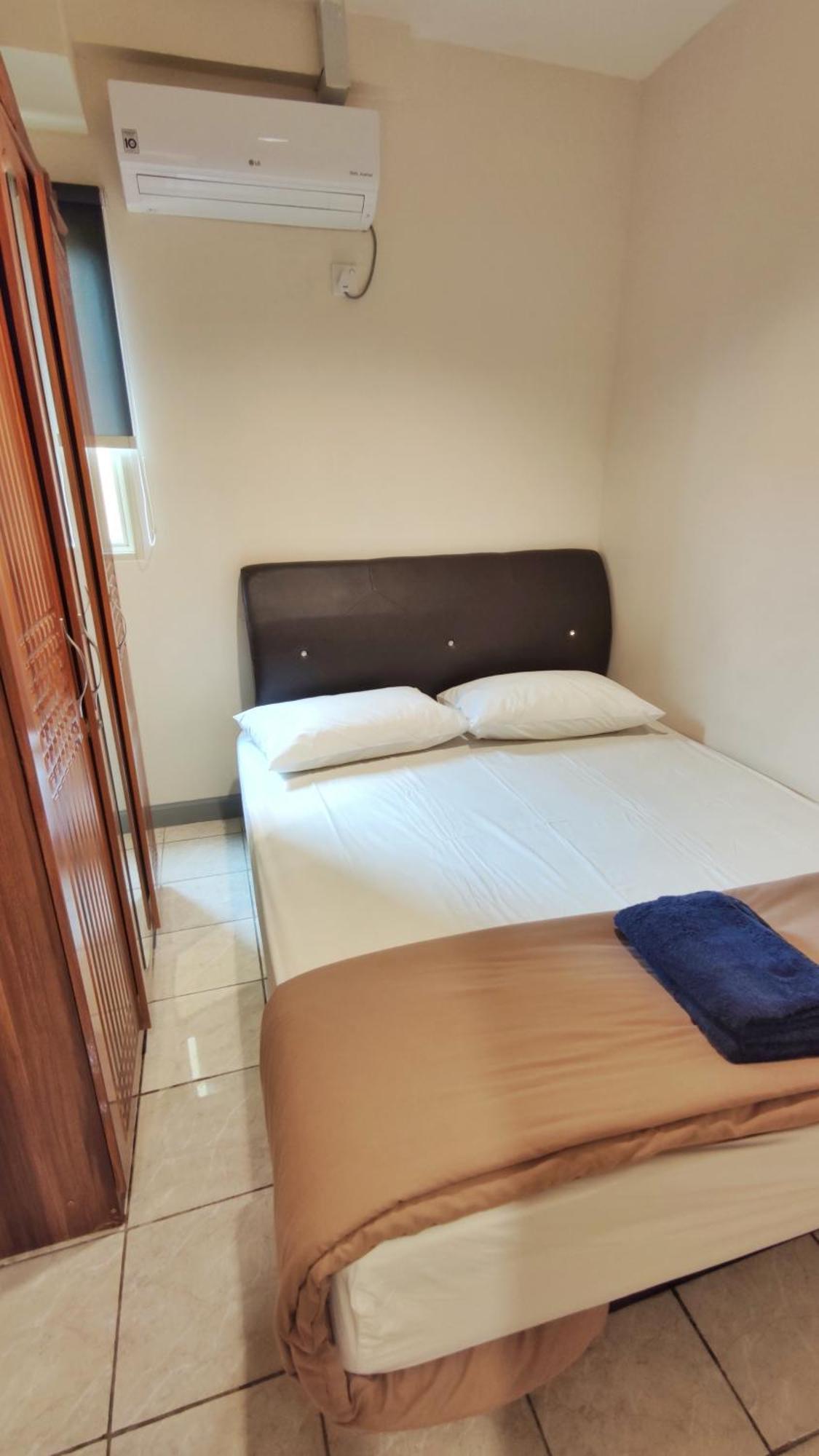 Queen Victoria Apartment Batam Szoba fotó